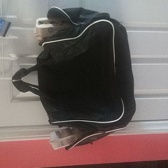 Addias duffle bag est 21x7x14$34 + Addias hat - Picture 4 of 7